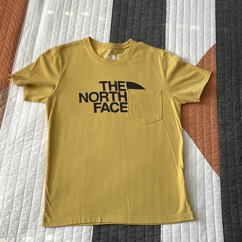 The North Face yellow pocket tee
